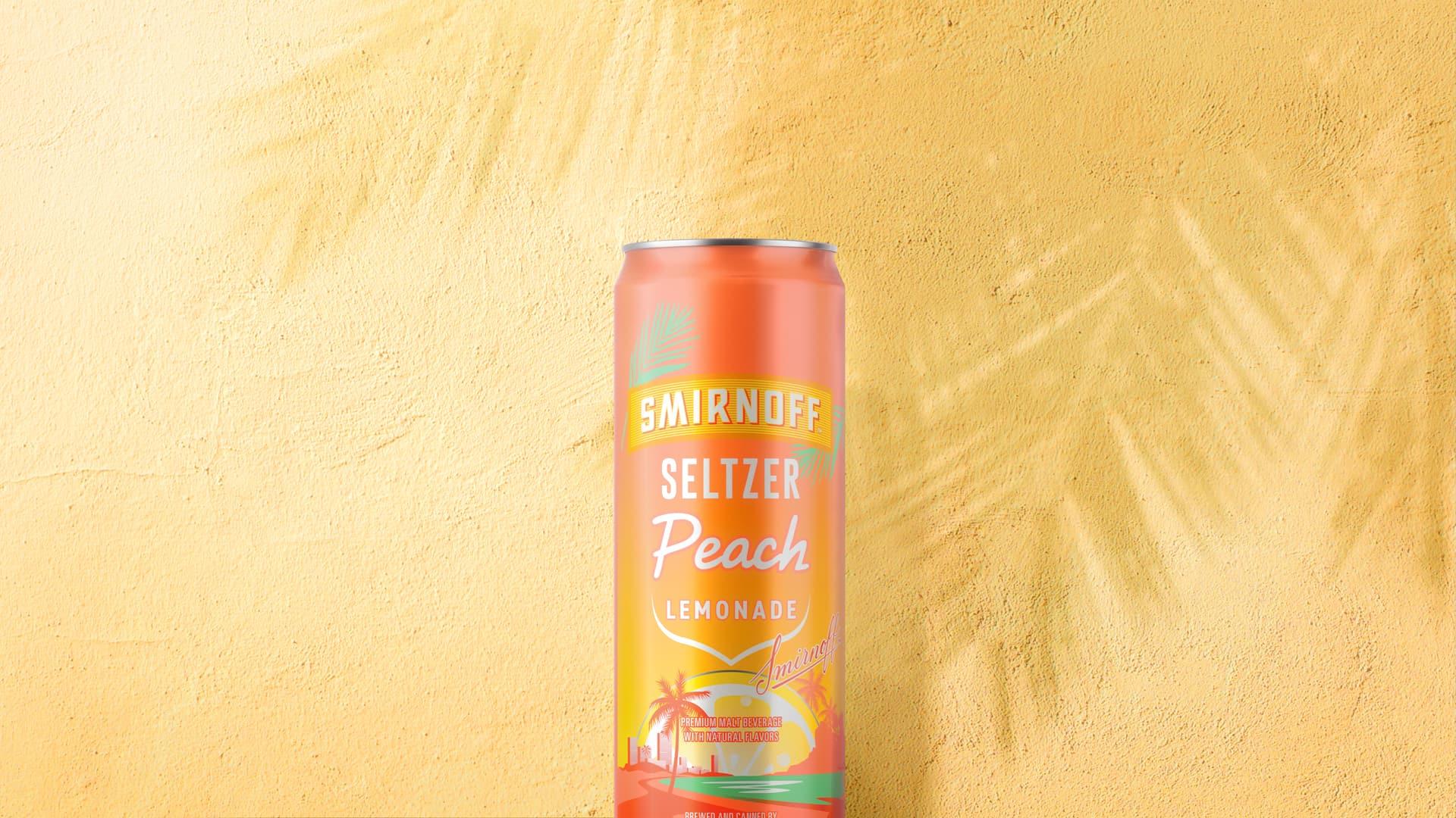 Smirnoff Seltzer Peach Lemonade on a tropical background