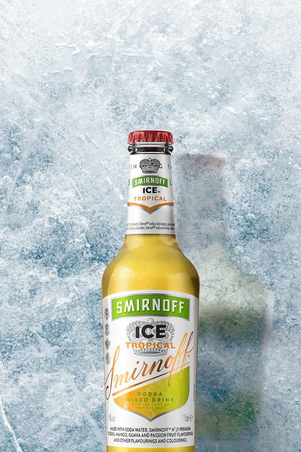 Smirnoff Ice Tropical on a Icy background
