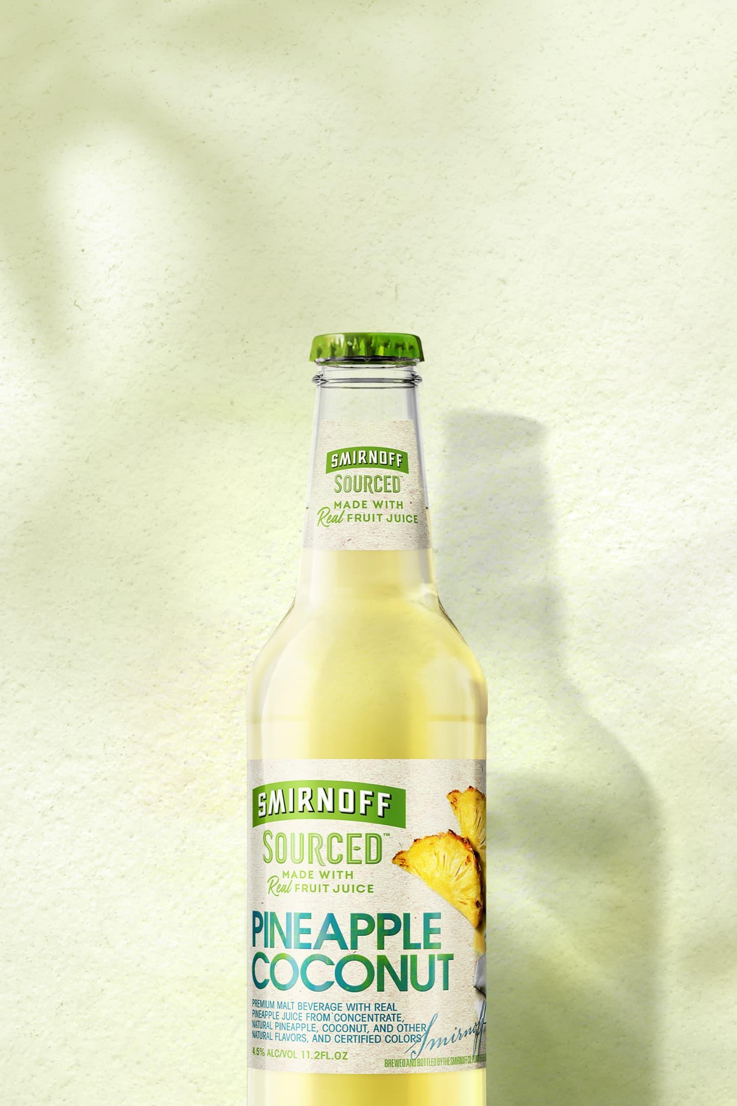 Smirnoff Sourced Pineapple Coconut on tropical background