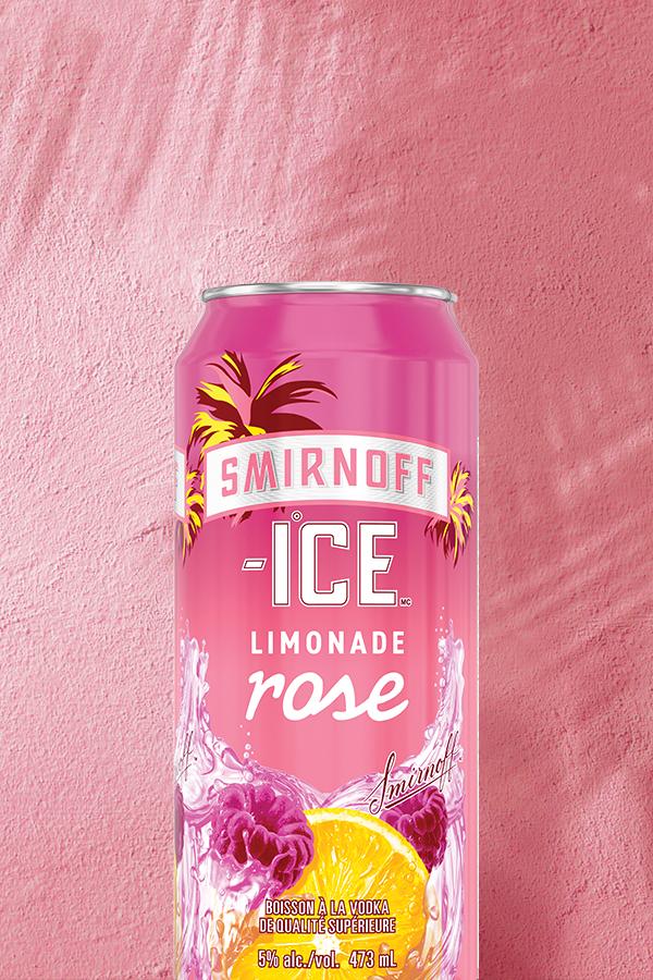 Smirnoff Ice Pink Lemonade on a tropical background