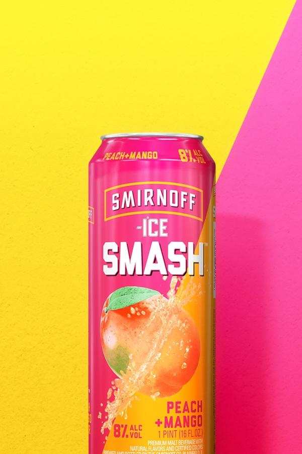 Smirnoff Ice Smash Peach + Mango on a two tone background