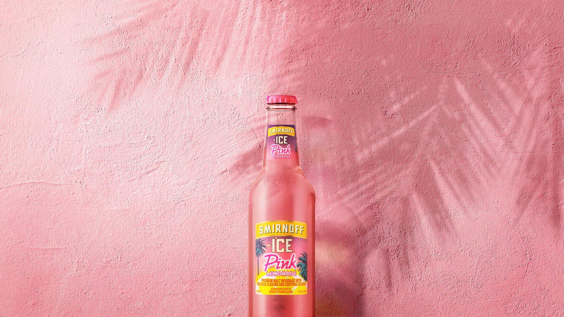 Smirnoff Ice Pink Lemonade on a tropical background