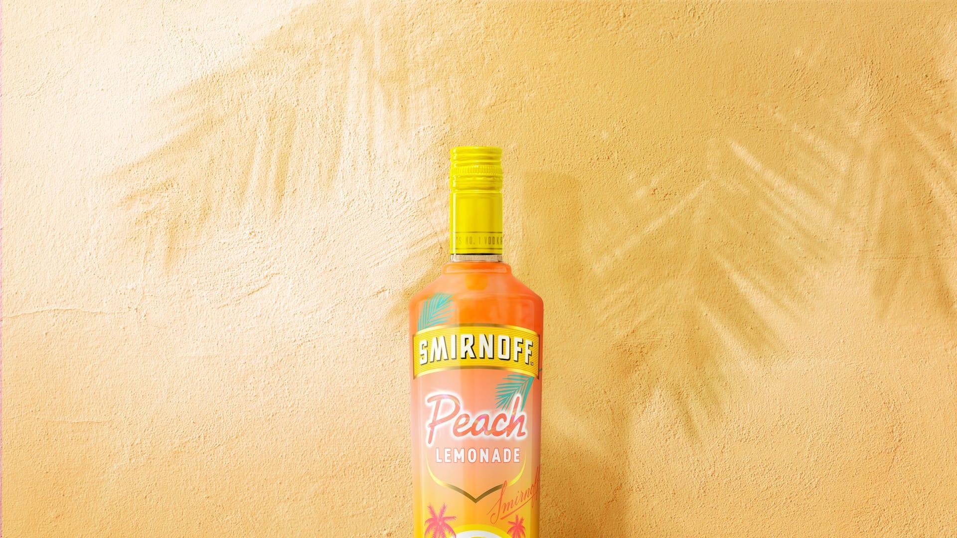Smirnoff Peach Lemonade on orange background with palm trees