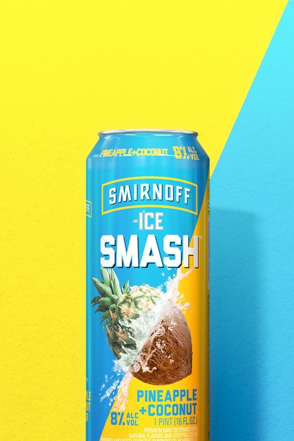 Smirnoff Ice Smash Pineapple + Coconut on a two tone background