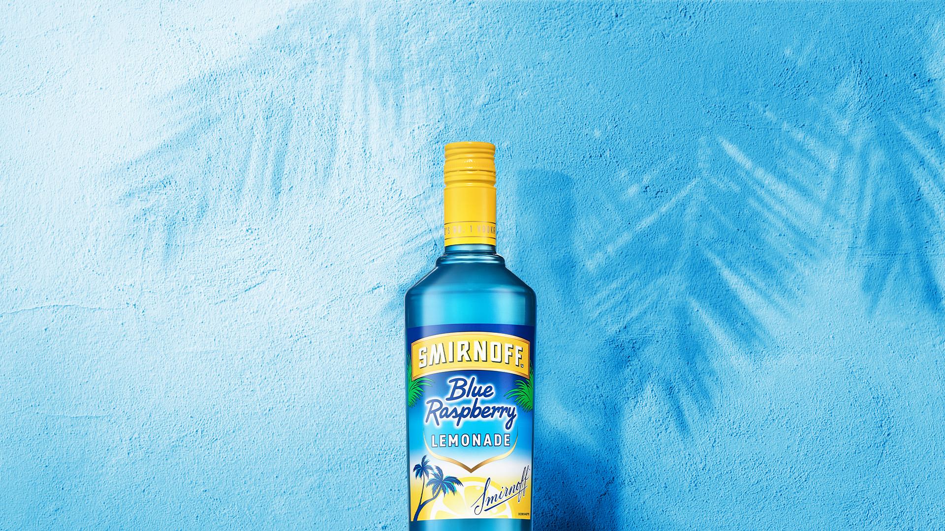 Smirnoff Blue Raspberry Lemonade on blue background with palm trees