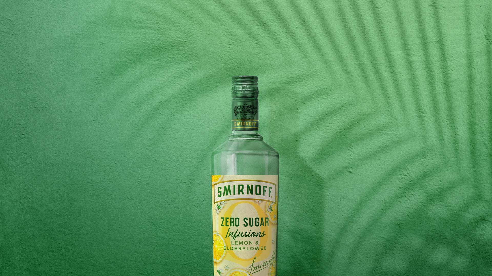 Smirnoff Zero Sugar Infusions Lemon & Elderflower on green tropical background