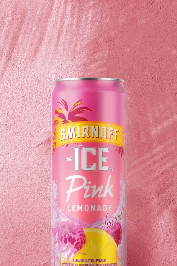 Smirnoff Ice Pink Lemonade Can on a tropical background