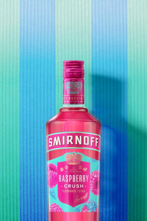 Smirnoff Raspberry Crush Vodka on a striped background