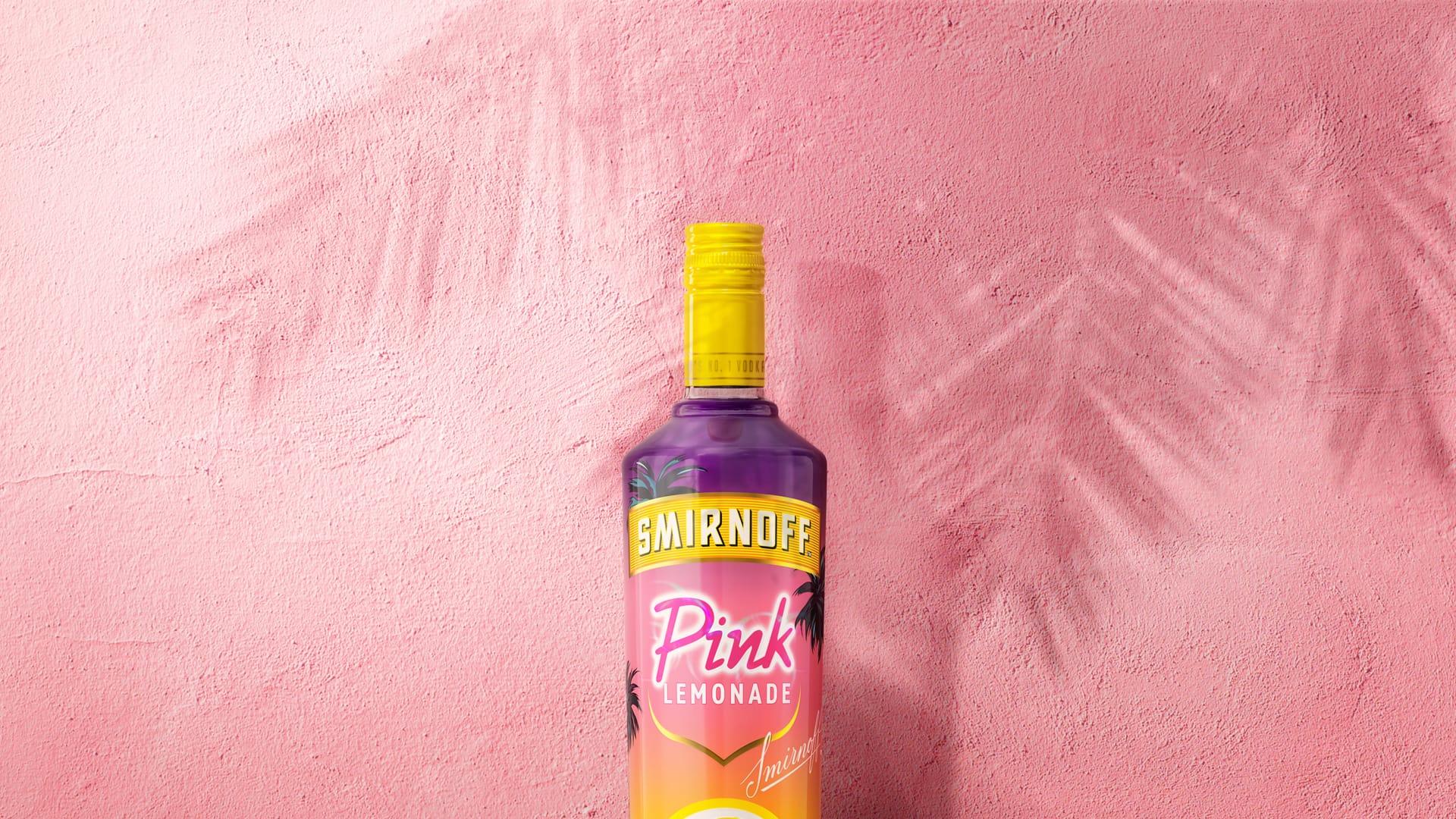 Smirnoff Pink Lemonade on pink background with palm trees