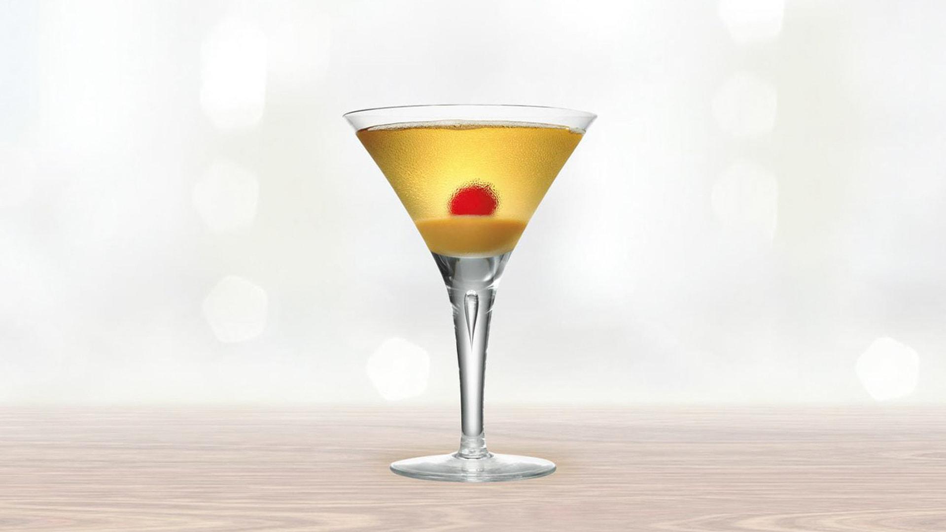 Creamy Caramel Martini on plain background