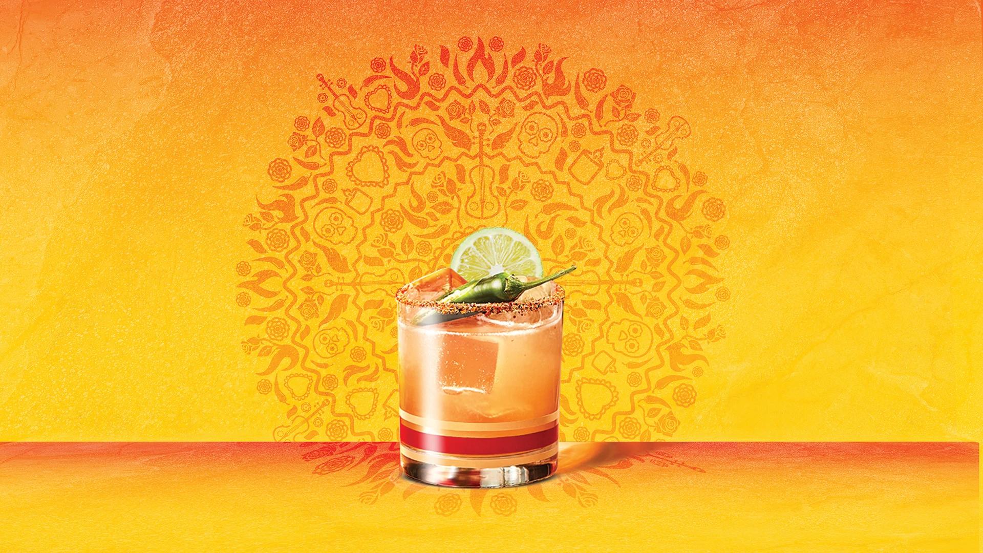 Smirnoff Spicy Tamarita on a yellow, red and purple aztec background