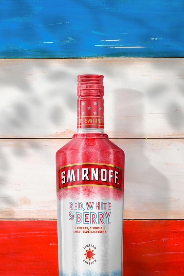 Smirnoff Red, White & Berry on a wood background