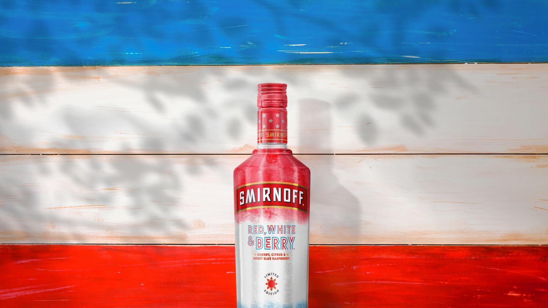 Smirnoff Red, White & Berry on a wood background