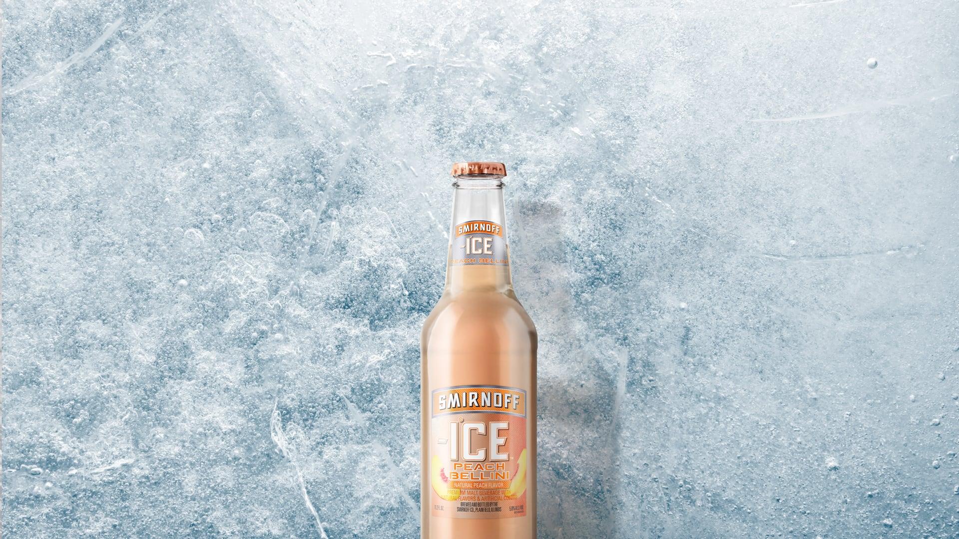 Smirnoff Ice Peach Bellini on a Icy background